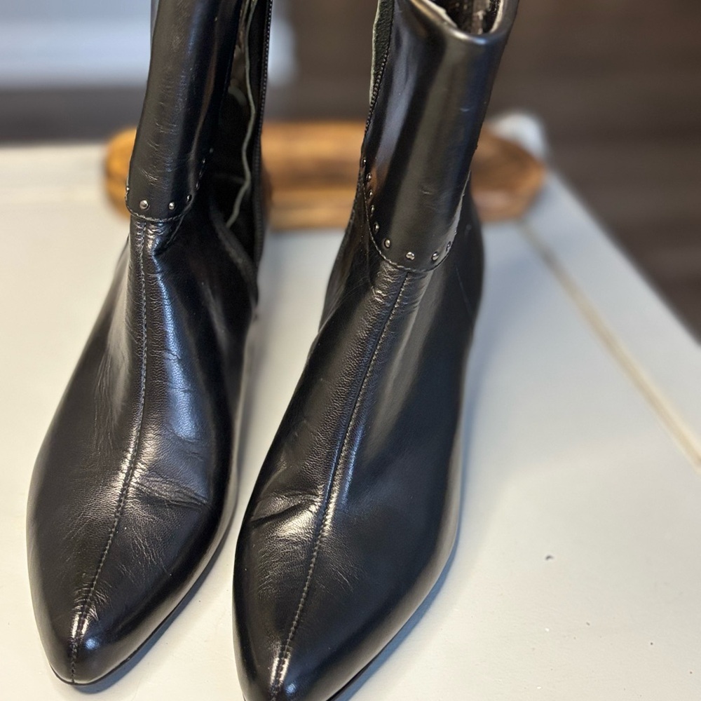 Tahari Black Ankle Boots with Slim Silhouette and Pointed Toe